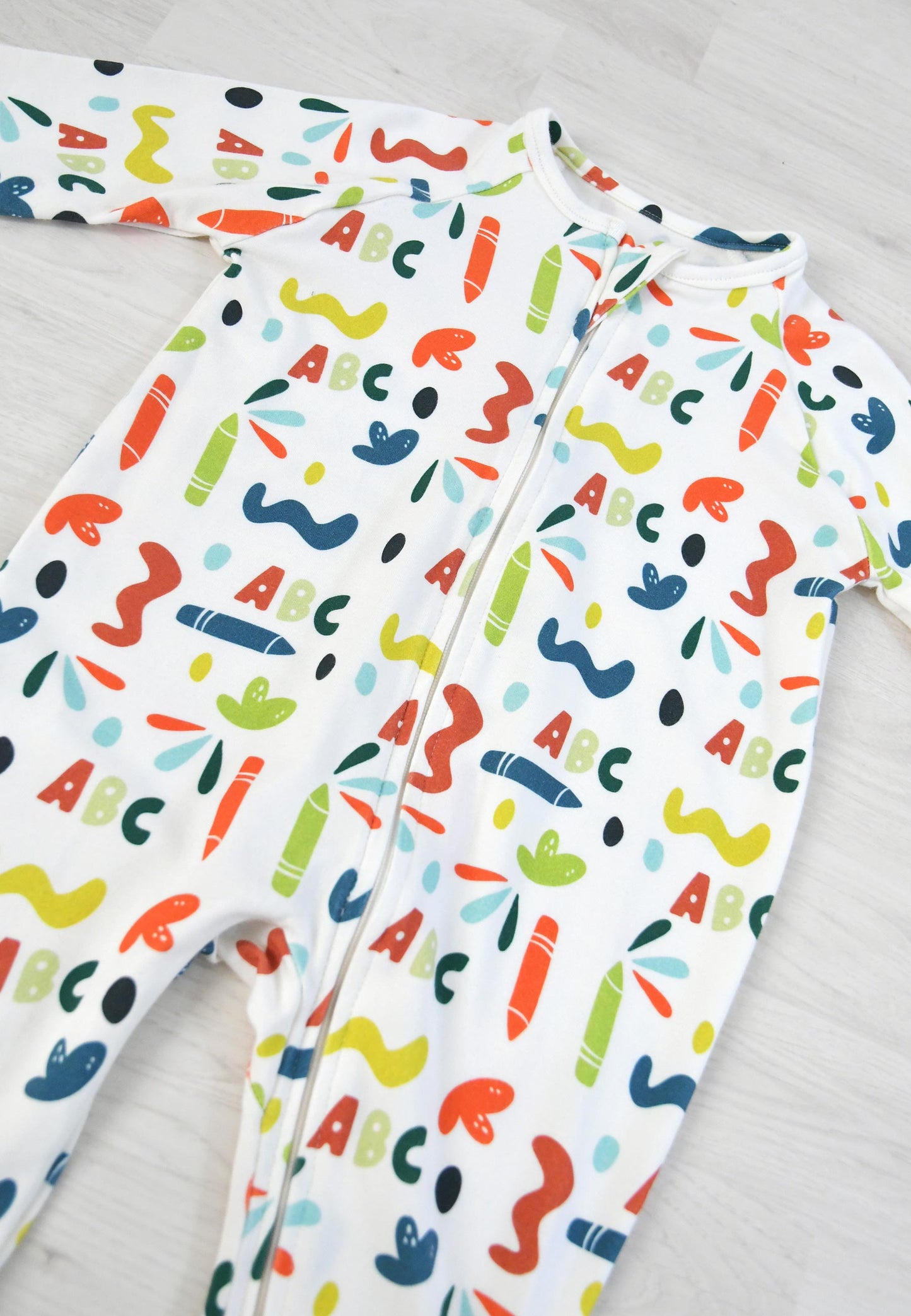 Tutina con zip in bambù - ABC - Palloncino blu